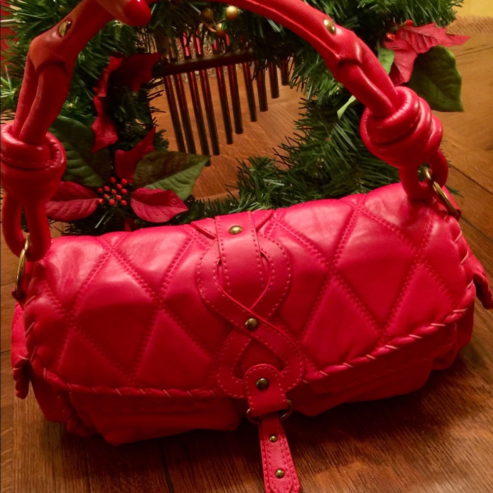 Red Isabelle Fiore satchel purse.